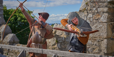 Actors display medieval weapons at Dalkey Castle - pic by DC actors with crossbow and bow and arrow at dalkey castle, dublin, ireland