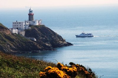 Passing-lighthouse-on-dublin-bay-cruise Dublin Bay Cruise boat passing lighthouse