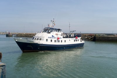 irish bay cruises at howth boat in the water at howth harbour