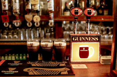 tppt three pints of guinness on a bar