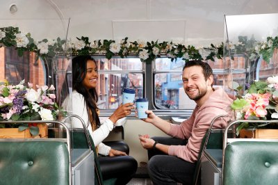 Man and a Woman on Vintage Tea Tours man and woman with coffee cups